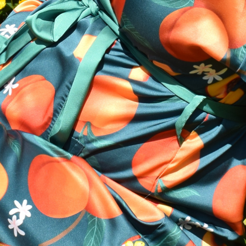 Close-up detail of peach-print robe